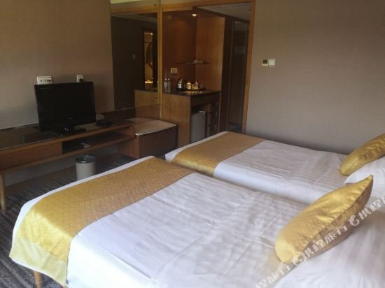 Фото Qingdao Kuaitong International Hotel