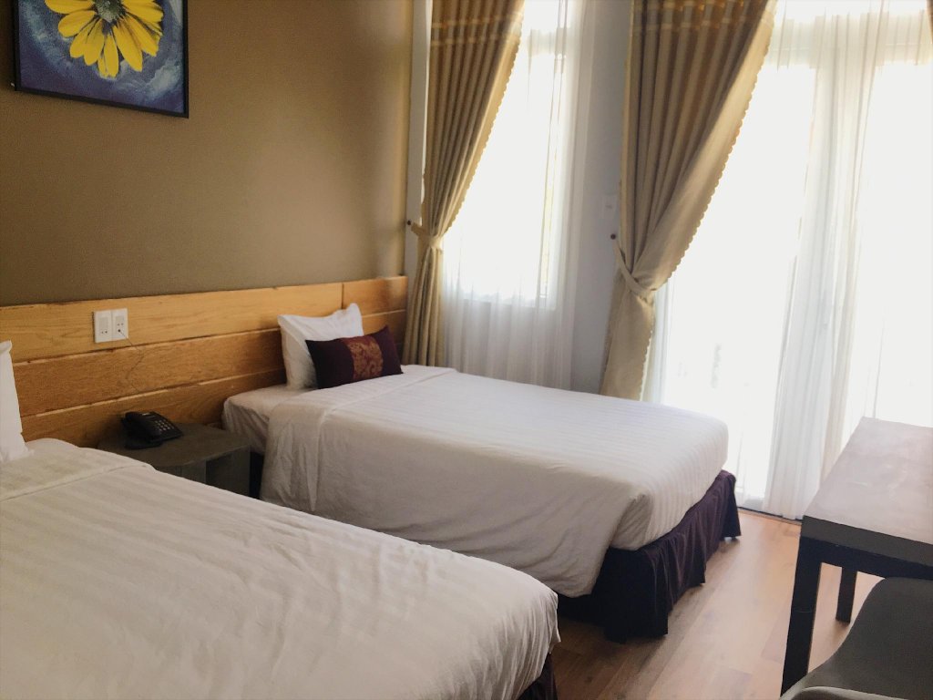 Фото Cozy Boutique Da Lat Hotel