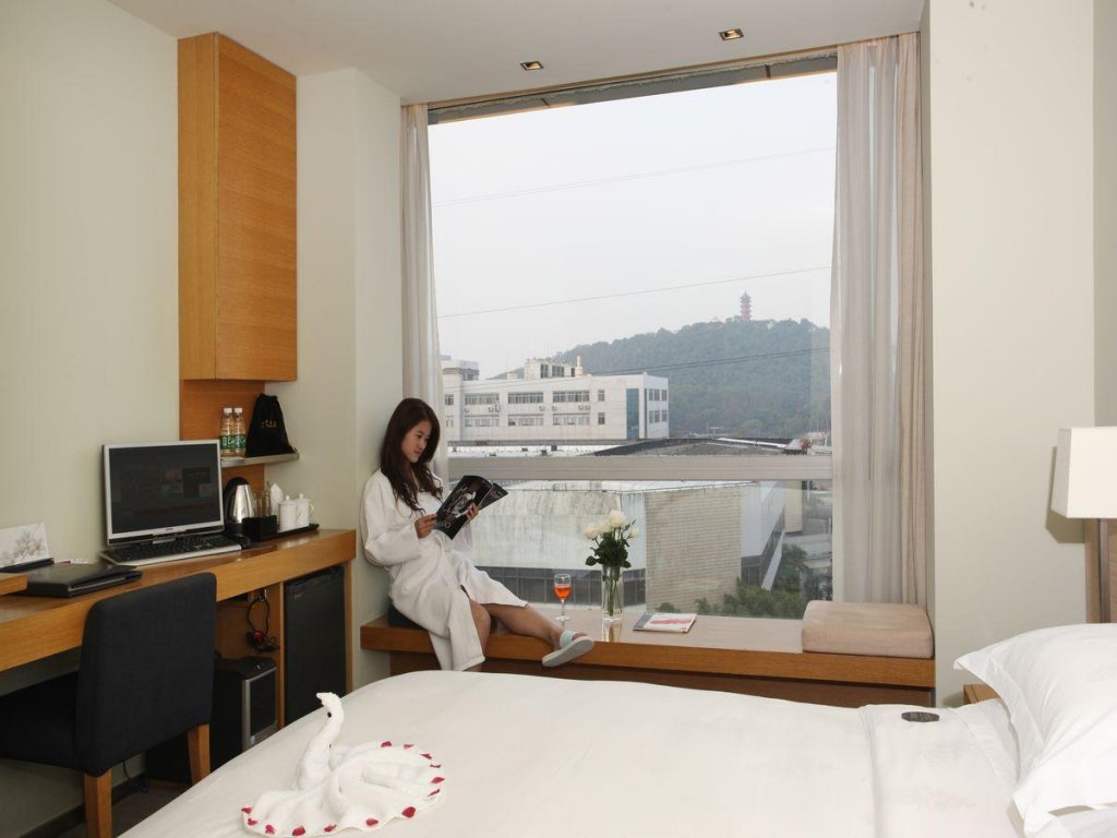 Фото Hotel Kapok Wuxi