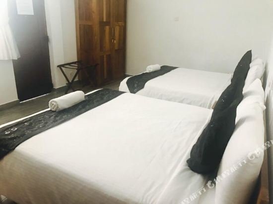 Фото Oyo 103 Lavinia Villa