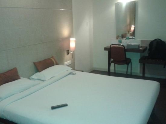 Фото Hotel Highland Residency