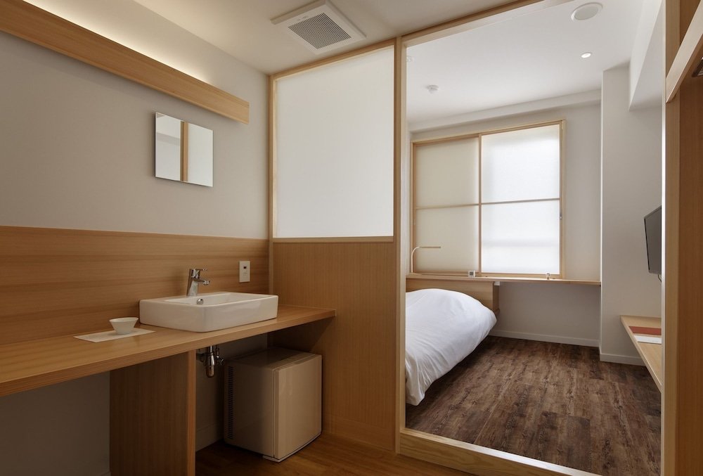 Фото Sendai Business Hotel