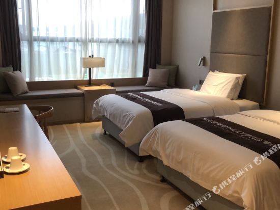 Фото Jingtang Ramada Encore Hotel