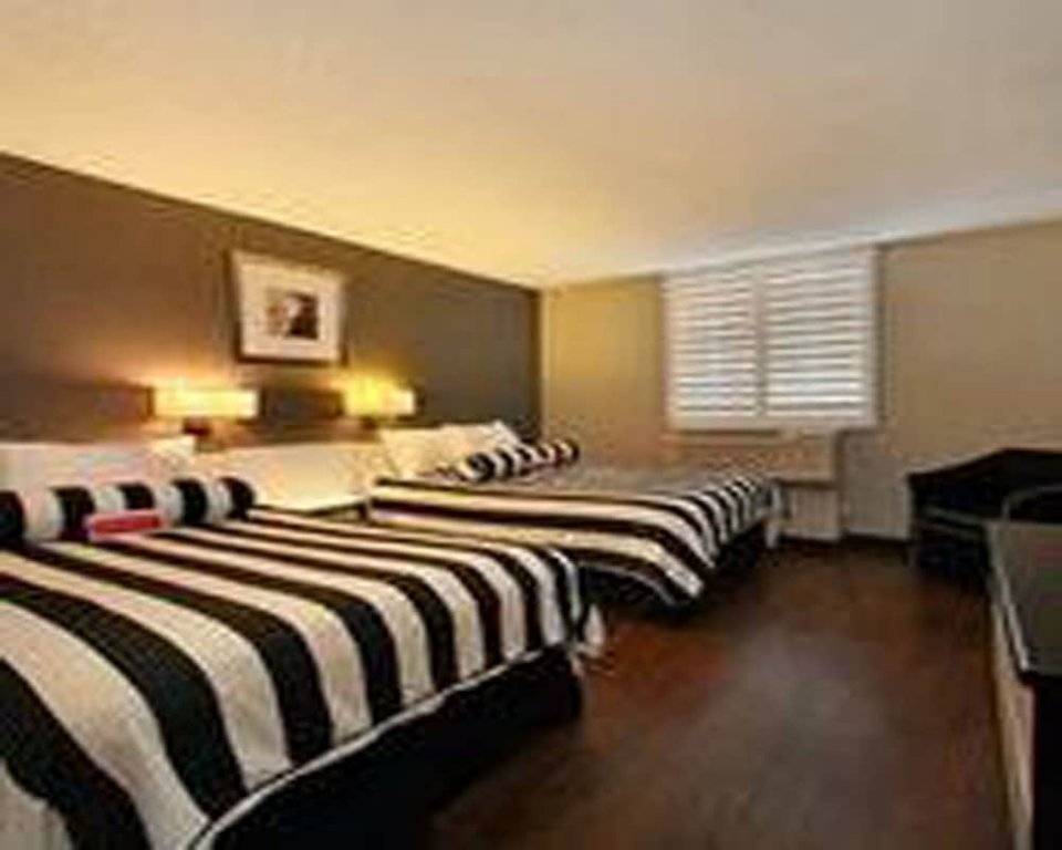 Фото Ramada Plaza by Wyndham West Hollywood Hotel & Suites