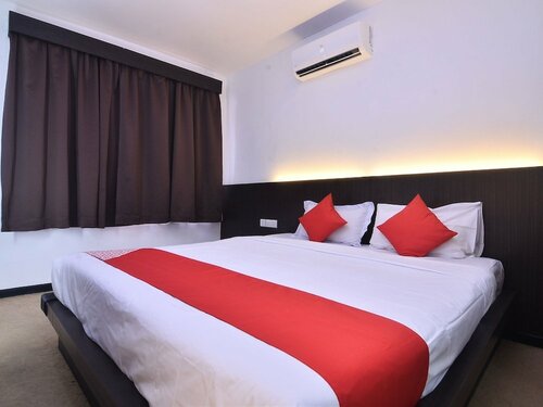 Гостиница Oyo 43960 Laksamana Executive & Boutique Hotel в Тавау