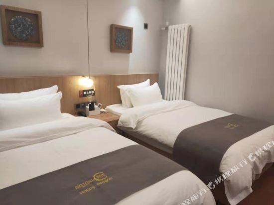 Фото Happy Dragon Saga Hotel (Beijing Tiananmen Wangfujing)