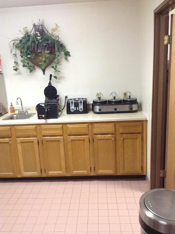 Фото Designer Inn & Suites