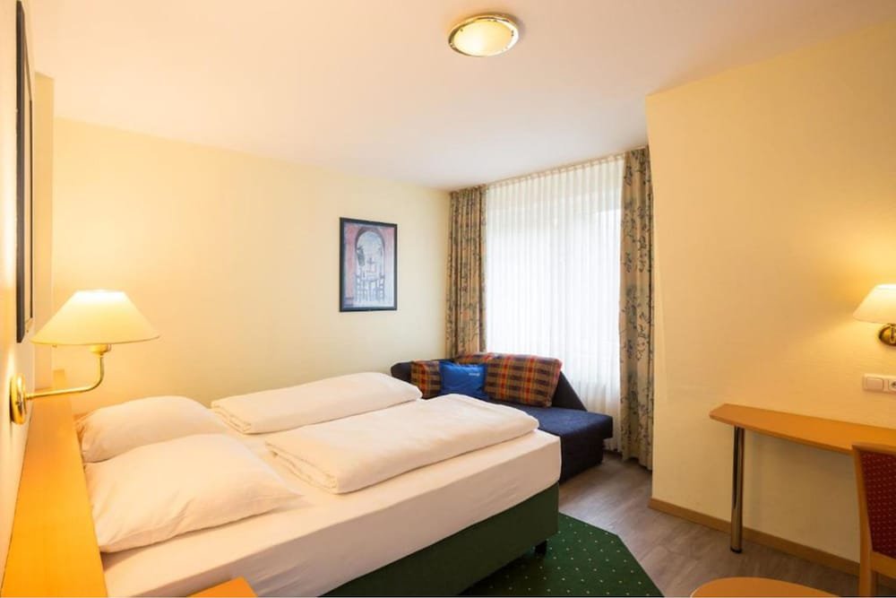 Фото Hotel Gremersdorf - Zum Grünen Jäger