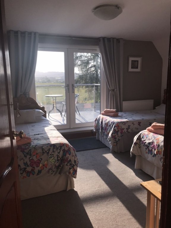 Фото Coralinn Bed & Breakfast