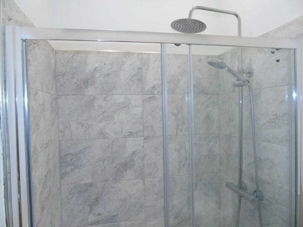 Фото Snug - Sealladh Mara Apartment