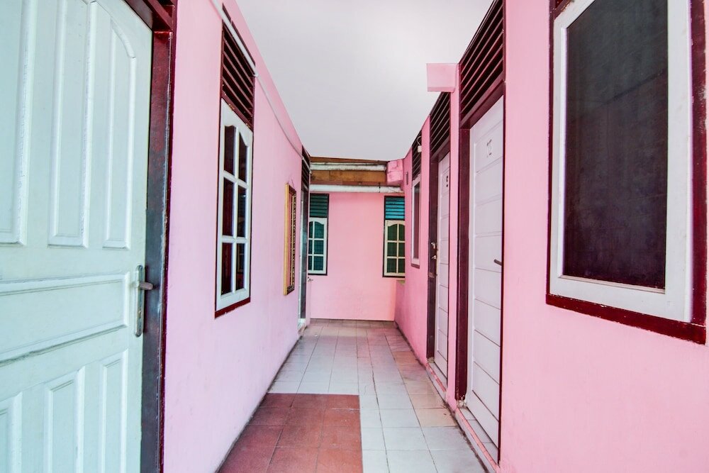 Фото Spot On 91858 Raja Homestay Syariah