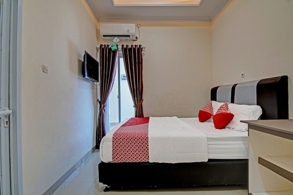 Фото Oyo 91269 R&s Living Residence