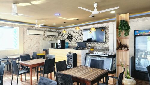 Гостиница Isle inn на Атолле Гнавийани