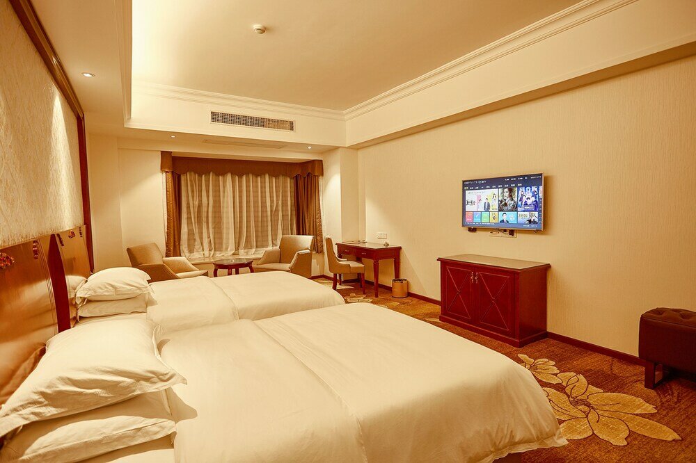 Фото Xinghui Hotel Guangzhou