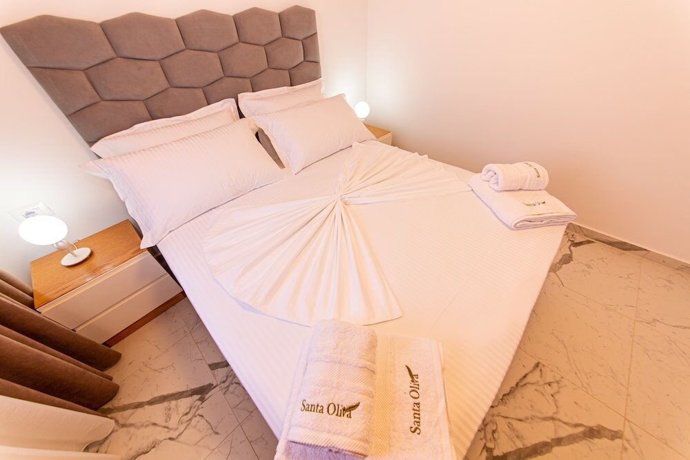 Фото Santa Oliva Suites