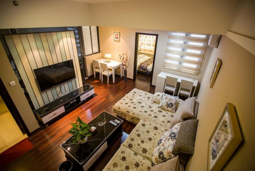 Фото Zixinju Aparthotel