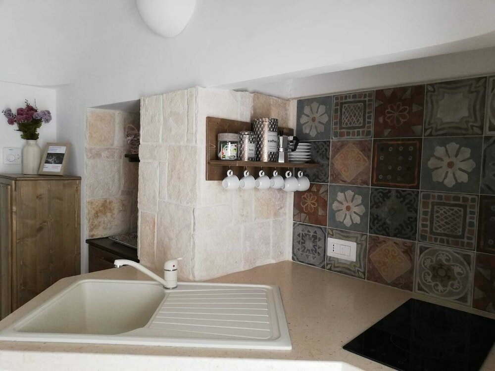 Фото Trulli Resort Monte Pasubio