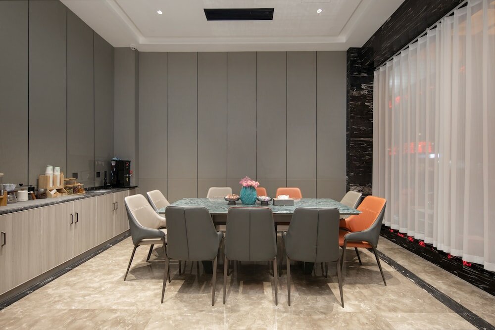 Фото Yiwu Manting City Hotel