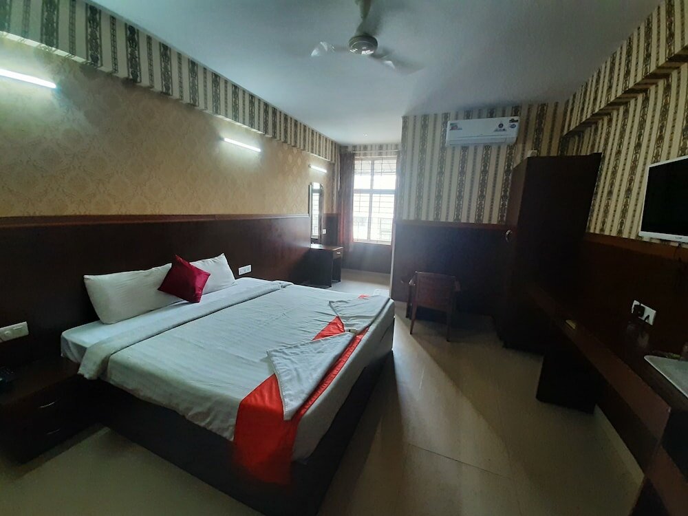 Фото Mysore Mayflower Hotel