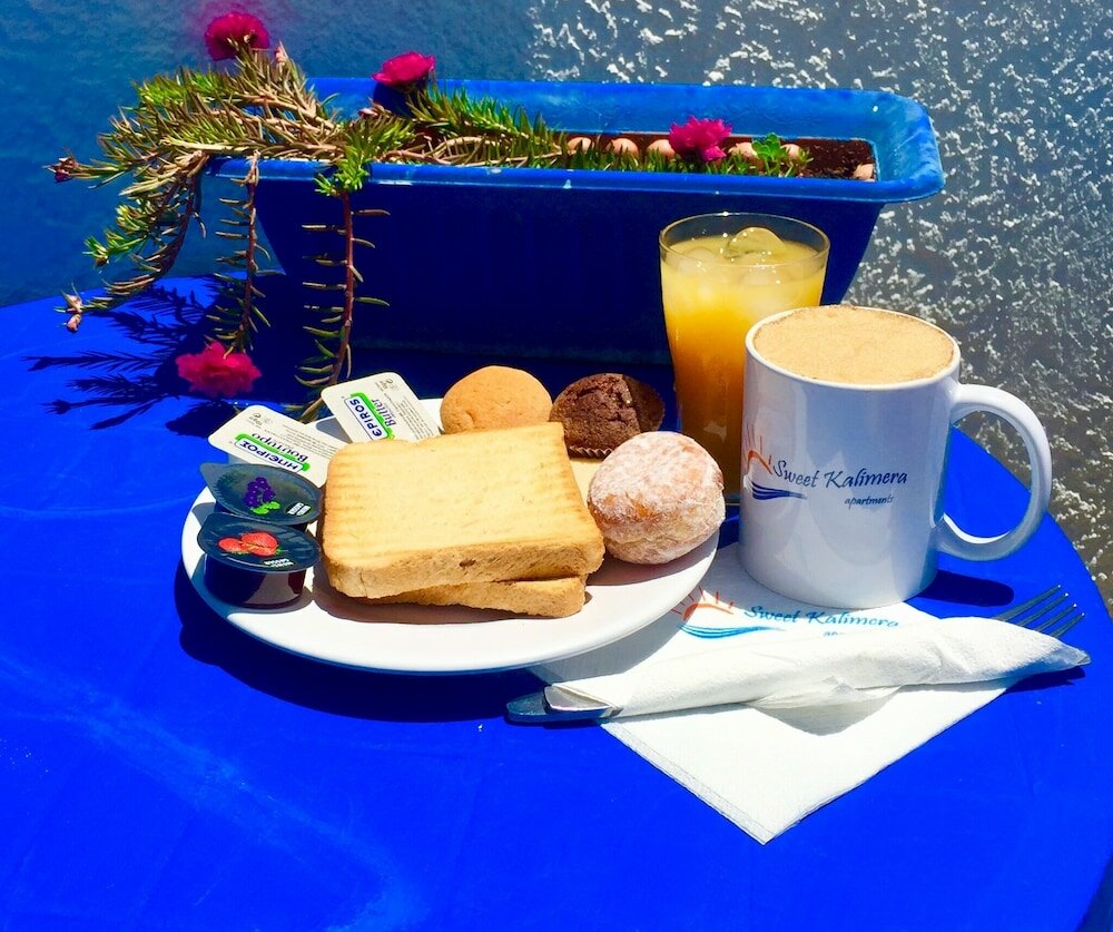 Фото Sweet Kalimera Apartments