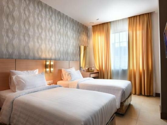 Гостиница Grand Impression Hotel Medan