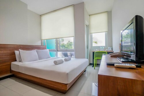 Гостиница LeGreen Suite Tebet в Джакарте