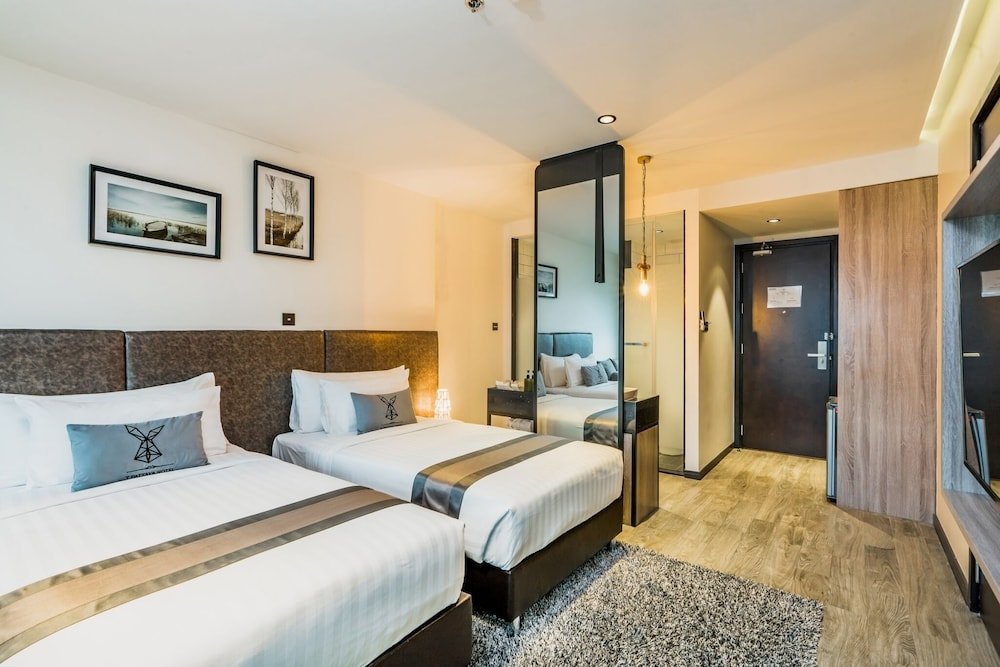 Фото T Pattaya Hotel