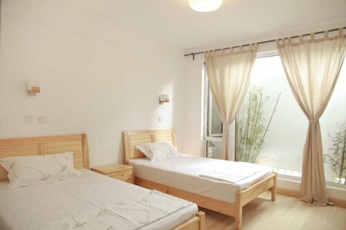 Гостиница Joy Plus International Youth Hostel в Даляне