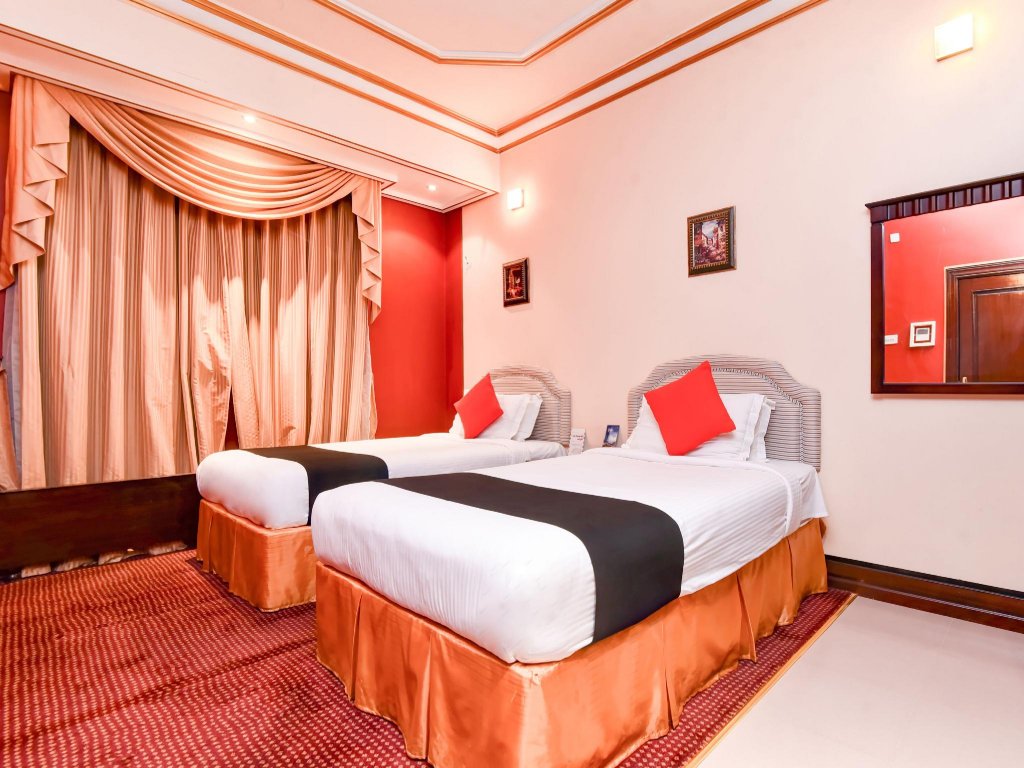 Фото Capital O456 Almansour Grand Hotel