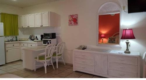 Фото Aruba Quality Apartments & Suites