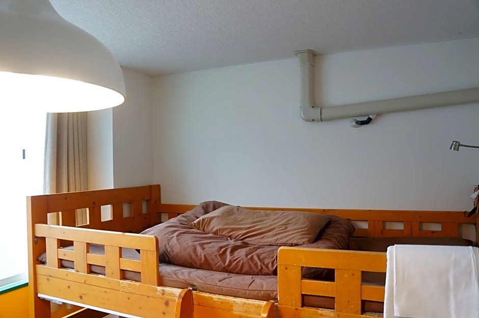 Фото J-Hoppers Osaka Guesthouse