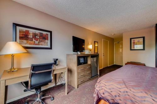 Фото Orangewood Inn & Suites Midtown