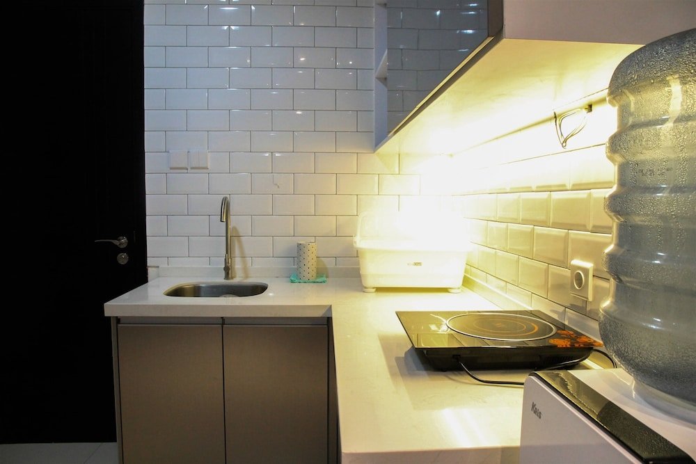 Фото Chic 1br Brooklyn Apartment near Ikea Alam Sutera