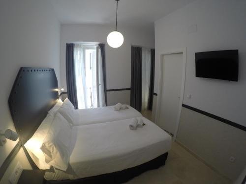 Фото Hostal Hom Museo