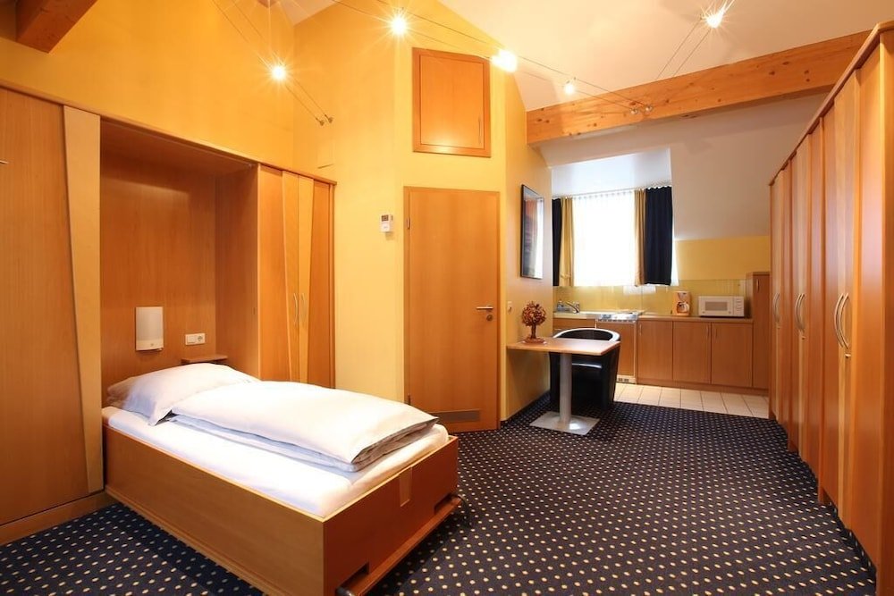 Фото Au P'tit Max - Studios Hotel