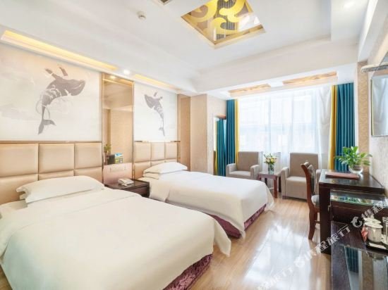 Фото Yiwu Yuejia Hotel