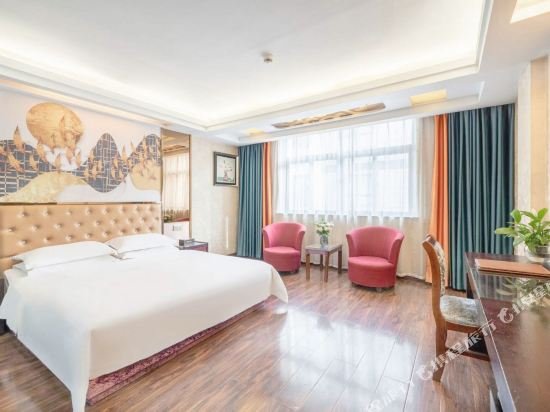 Фото Yiwu Yuejia Hotel