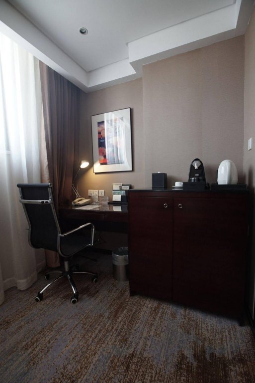 Фото Shanghai Greenland Jiulong Hotel