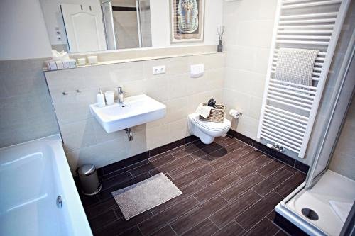 Фото Stadthaus by Hentschels Apartments