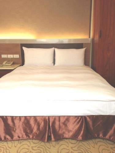 Фото Puyisy Business Hotel