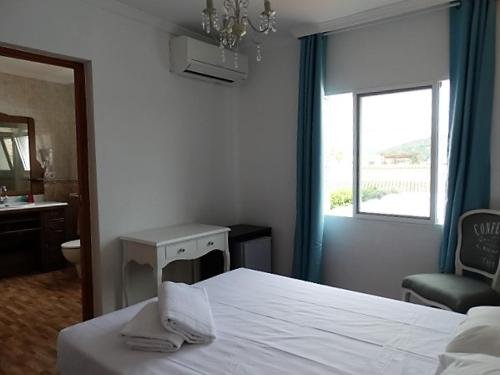 Фото Hotel Casa Día y Noche