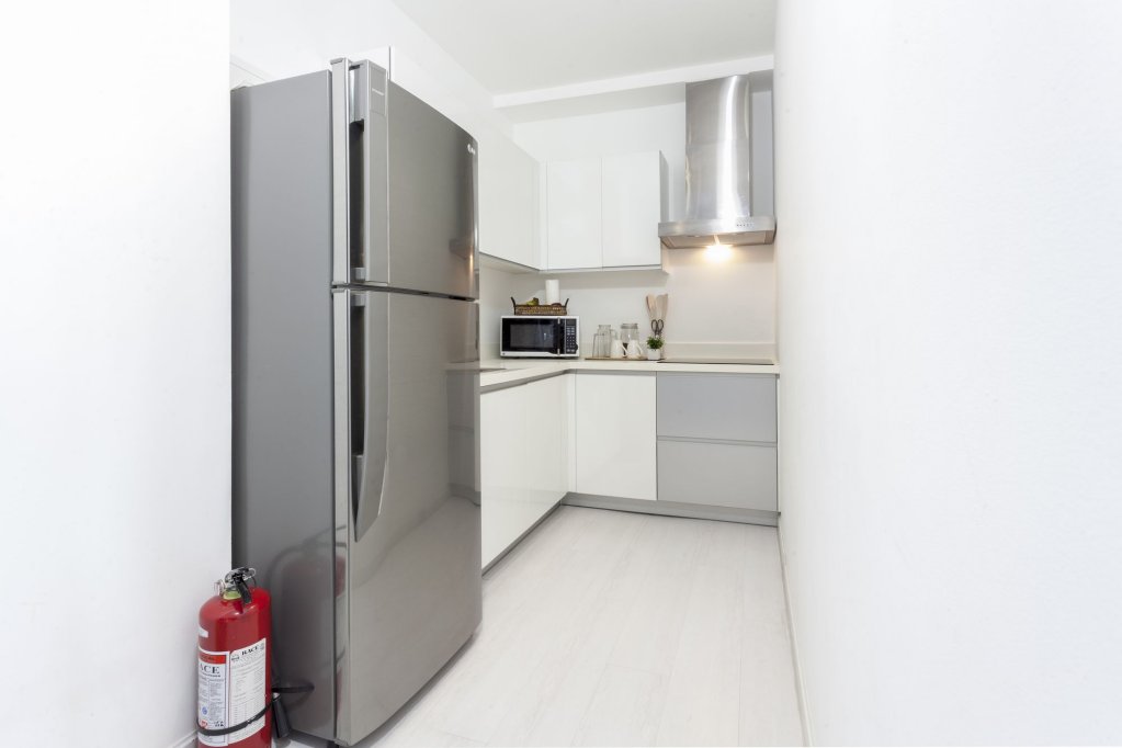 Фото The Gramercy Residences by StayHome Asia