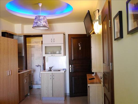 Фото Captain's Beach Boutique Apartments