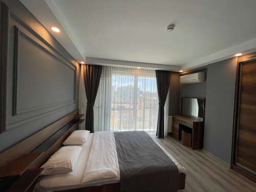 Гостиница On4 Rooms & Suites в Аташехире