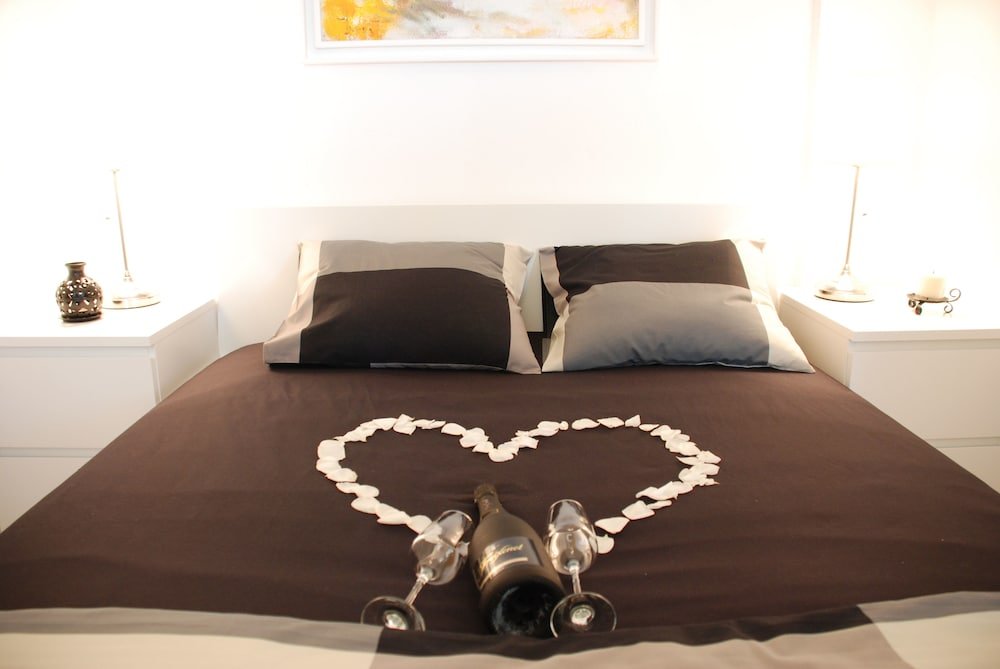 Фото Luigi apartments