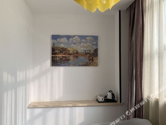 Фото Greentree Inn Suzhou Taicang Baolong Square Express Hotel