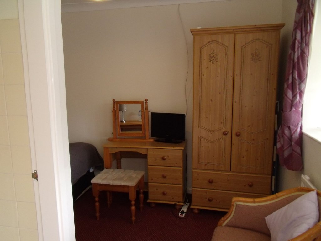 Фото The New Inn Motel