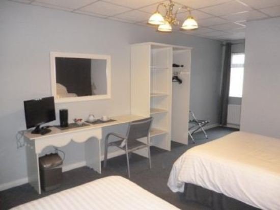 Фото 5 Corners Guest Inn