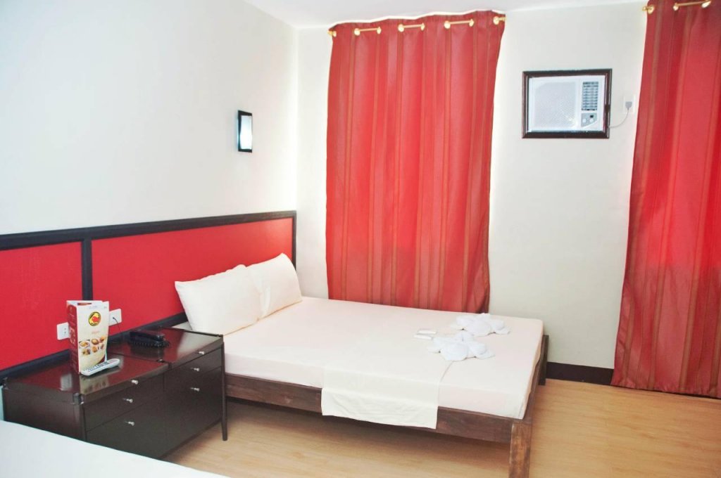 Фото Asiatel Hotel, Sta. Rosa, Laguna