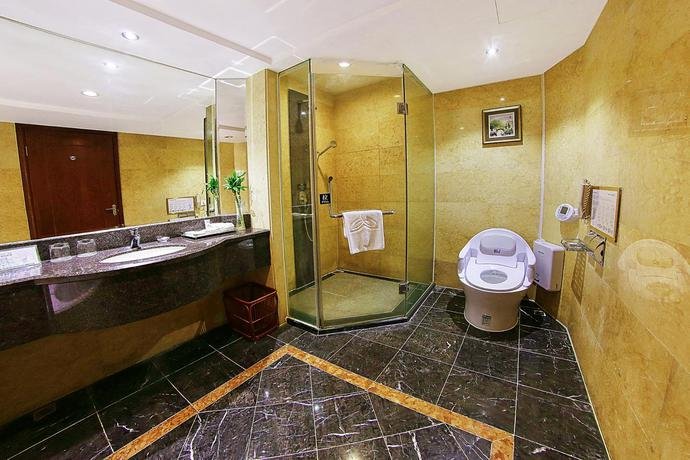 Фото Jiangmen Gladden Hotel